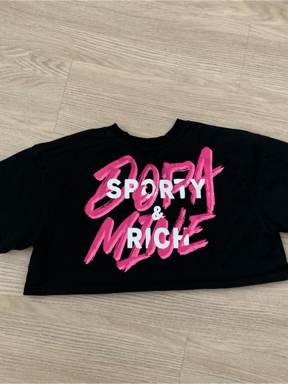 Sporty & Rich Black Tee with Hot Pink Brush Graphic